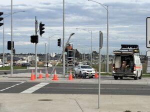 Driver hospitalised and stoplight down after intersection crash