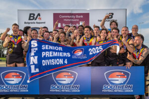 Hawks hoist first ever flag