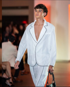 Ashton shines in Fashion Week Debut