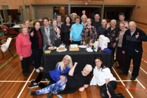 Italian elderly club carves 35 years of cake, cards and coffee
