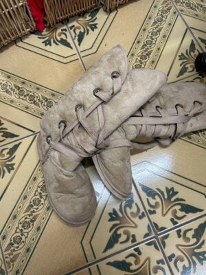 Unexpected treasure in donated boots, police search for rightful owners